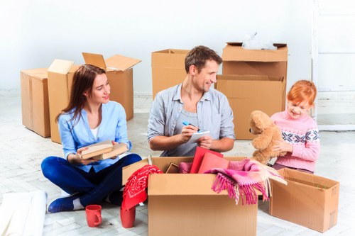 Local moving van helping with furniture transport in Isleworth