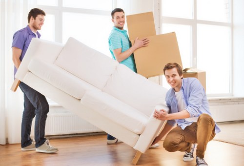 Packing boxes and preparing for a move in Isleworth