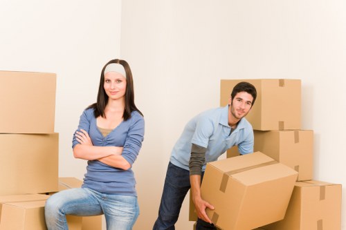 Packed office furniture ready for a business move in Isleworth