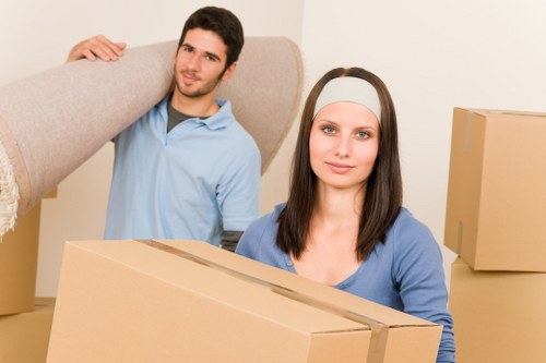Careful boxing and labelling of household items for relocation