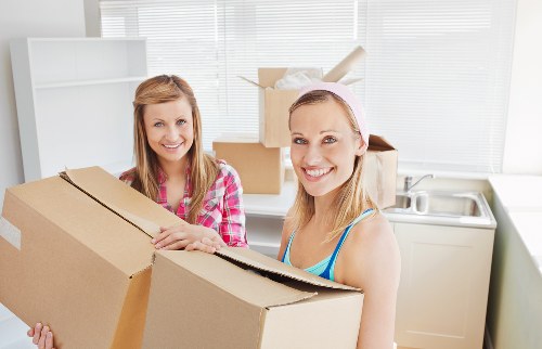 Careful furniture handling during a home move in Isleworth